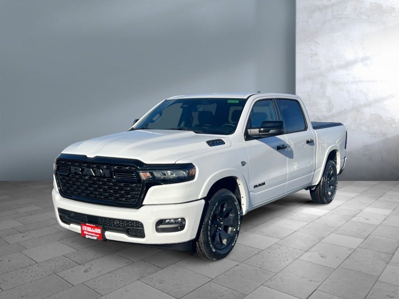 2026 RAM Ram 1500 RAM 1500 BIG HORN CREW CAB 4X4 5'7' BOX in Bright White Clear-Coat Exterior Paint — front three-quarter view