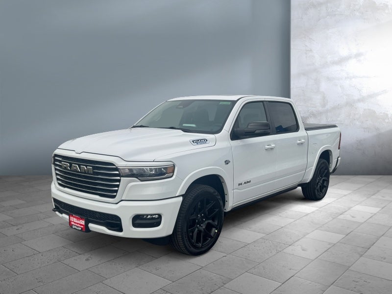 2026 RAM Ram 1500 RAM 1500 LARAMIE CREW CAB 4X4 5'7' BOX in Bright White Clear-Coat Exterior Paint — front three-quarter view