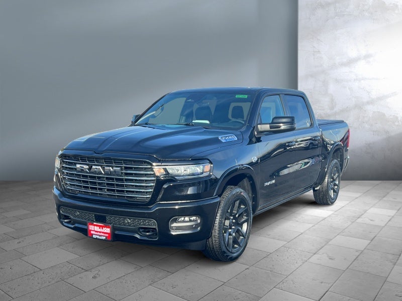 2026 RAM Ram 1500 RAM 1500 LARAMIE CREW CAB 4X4 5'7' BOX in Diamond Black Crystal Pearl-Coat Exterior Paint — front three-quarter view
