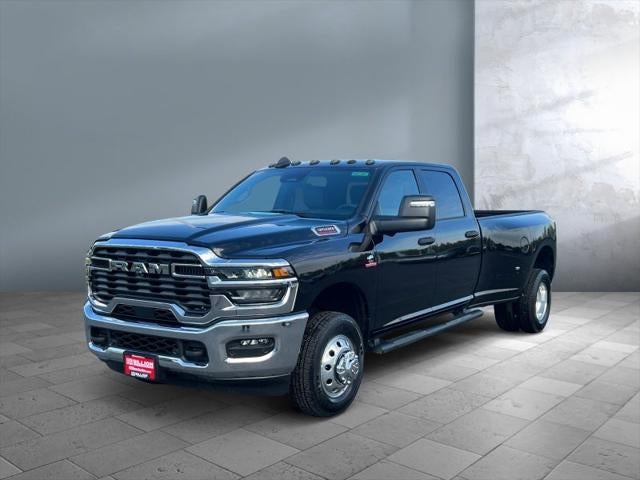 2026 RAM Ram 3500 RAM 3500 TRADESMAN CREW CAB 4X4 8' BOX in Diamond Black Crystal Pearl-Coat Exterior Paint — front three-quarter view
