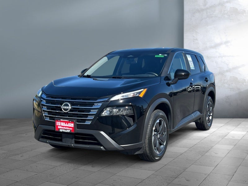 2025 Nissan Rogue SV Intelligent AWD in Super Black — front three-quarter view