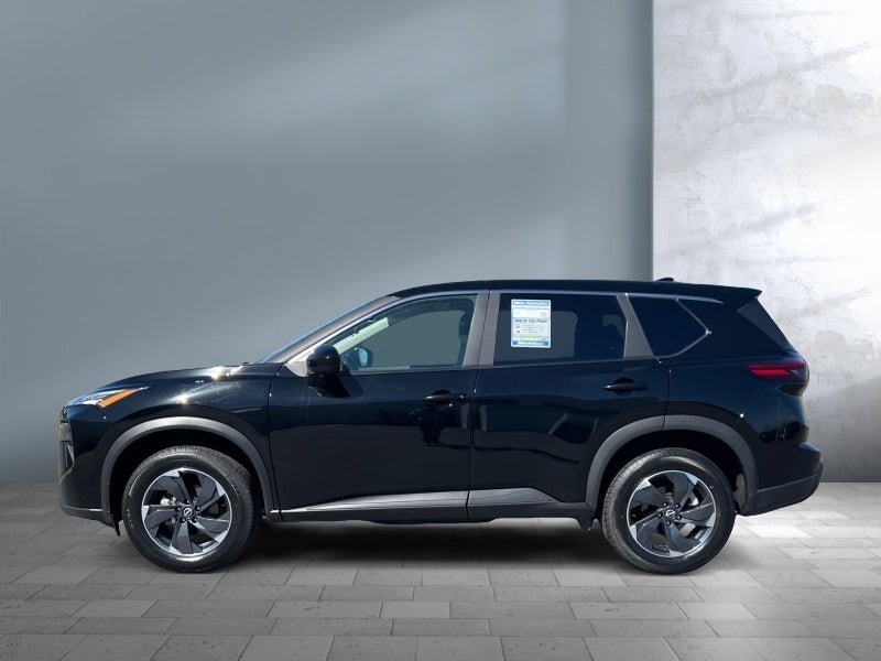 2025 Nissan Rogue — rear three-quarter view